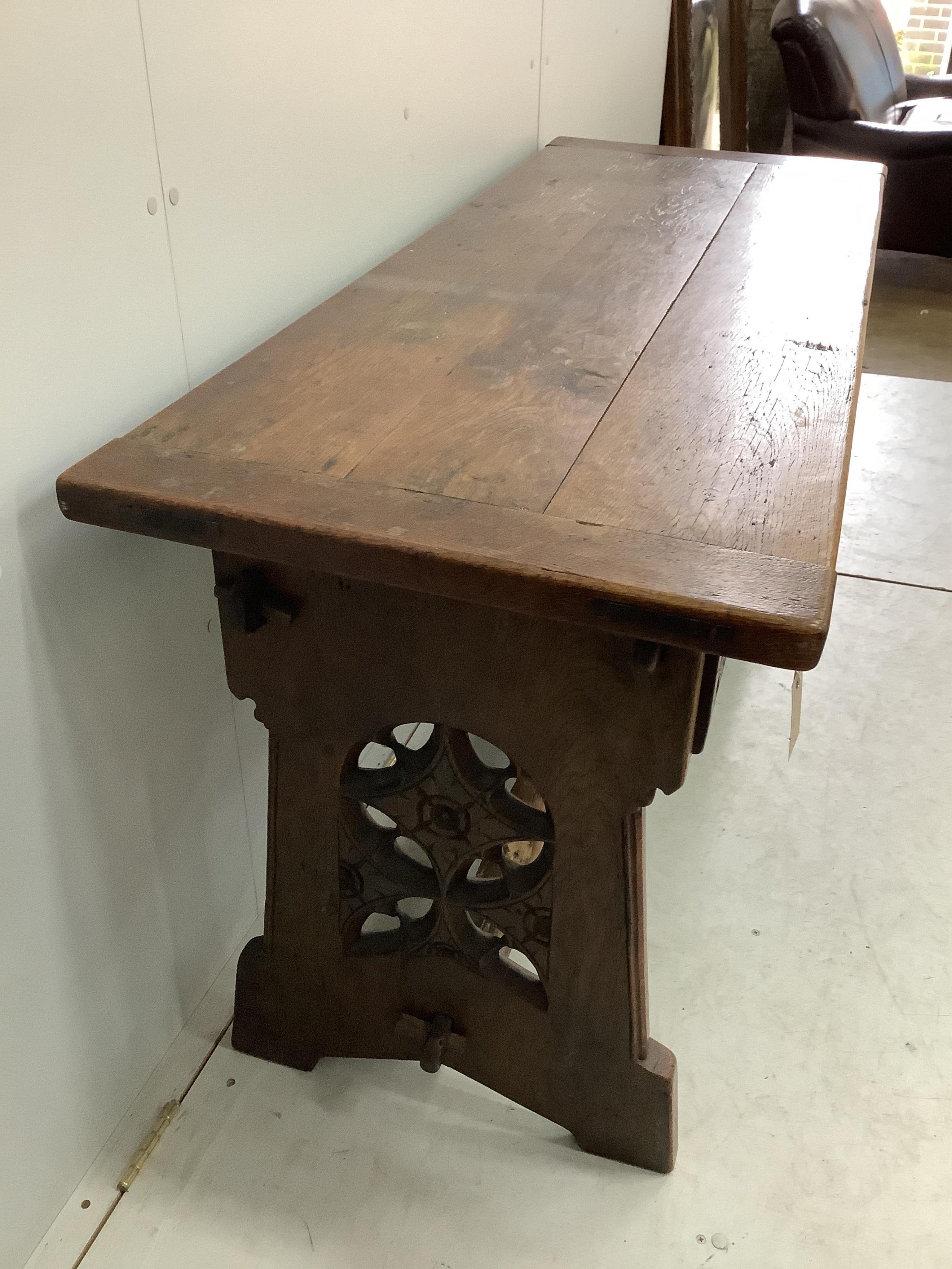 A 17th century style oak serving table, width 153cm, depth 58cm, height 75cm. Condition - fair